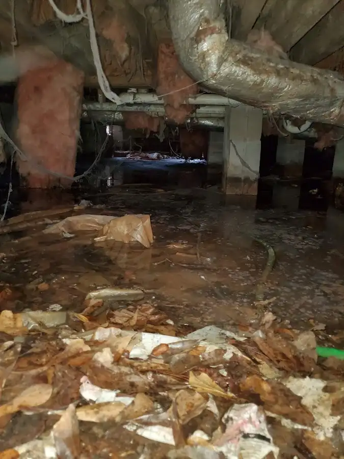 Crawl space flood assessment for Commercial Water Damage Restoration in Simsbury